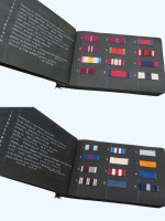 An album of 162 medal ribbons, British & Foreign, and 37 black & white photographs