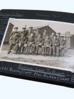An album of 162 medal ribbons, British & Foreign, and 37 black & white photographs