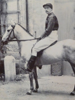 1890s albumen print of a Victorian dashing jockey on a horse