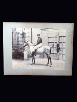 1890s albumen print of a Victorian dashing jockey on a horse
